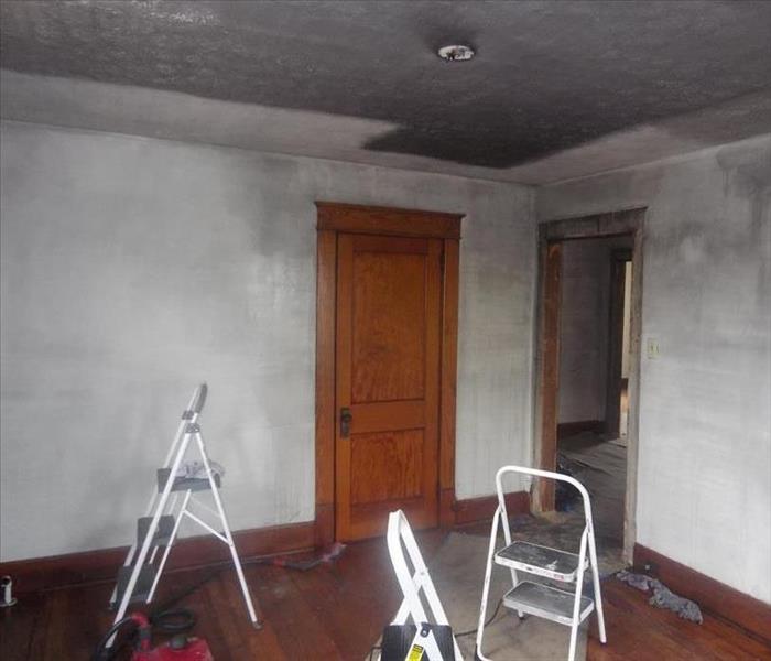 A fire damaged home with smoke and soot on every surface awaiting our fire restoration crews