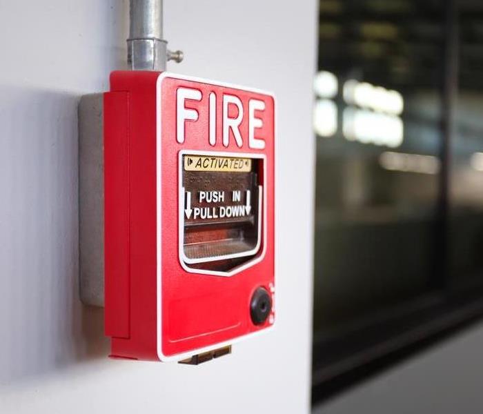 Fire alarm system on a wall.