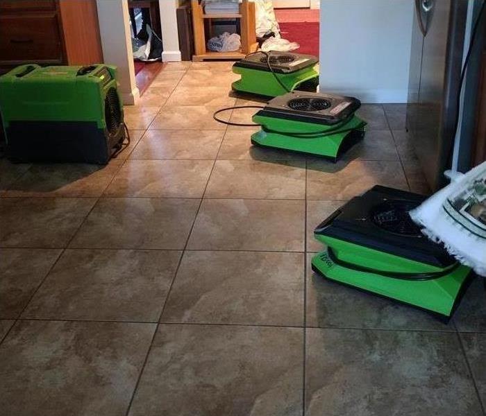 Air movers in a kitchen floor