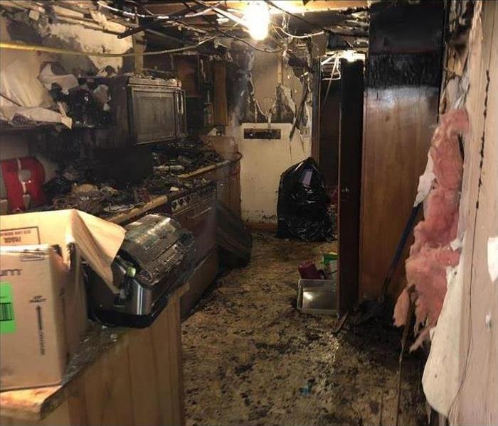 Kitchen fire damage. Severe fire loss in a kitchen